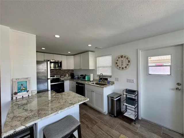 a workspace with furniture window and outside view