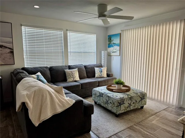 a dining room with furniture window and outside view