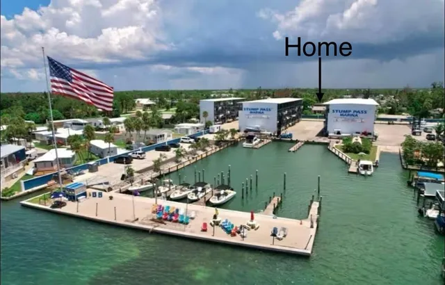 a bathroom with a sink mirror and toilet