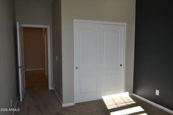 a bathroom with a double vanity sink and mirror