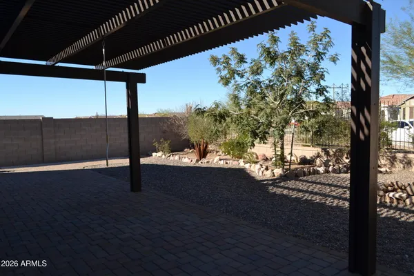 a view of a street with a building in the background