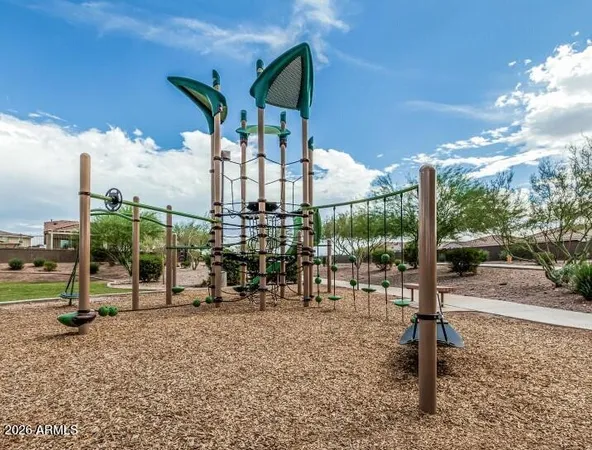 a view of a park with potted plants