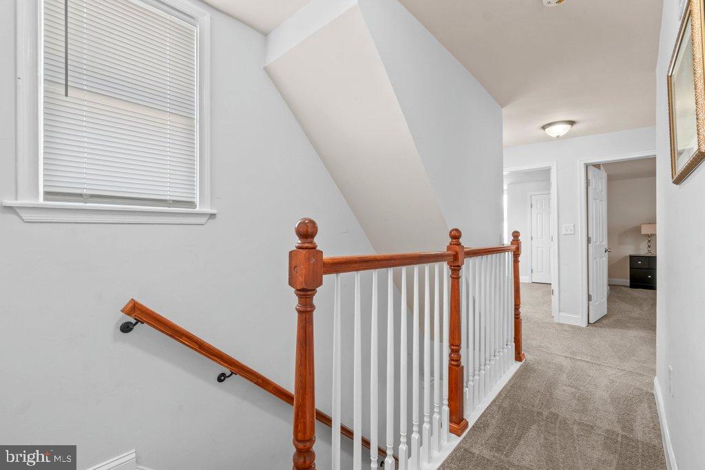 4919 Harford Road Baltimore, MD 21214 - Photo 25 of 48 a view of hallway with stairs and a window