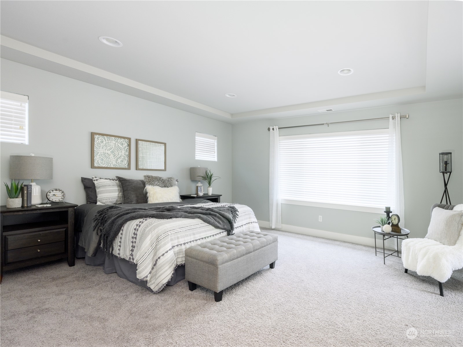 21502 44th Drive Southeast Bothell, WA 98021 - Photo 16 of 35 a spacious bedroom with a bed and a couch