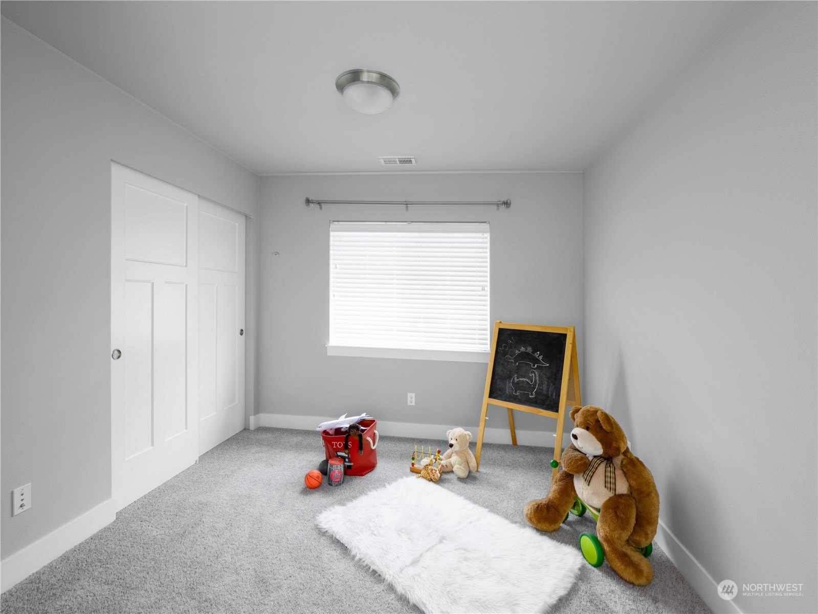 21502 44th Drive Southeast Bothell, WA 98021 - Photo 24 of 35 a bedroom with furniture and a window