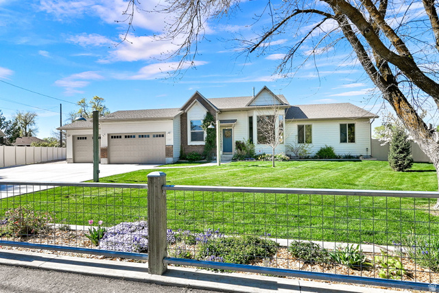 2137 West 200 S Street Marriott-Slaterville, UT 84404 - Photo 1 of 1 Custom front fence and mature landscaping