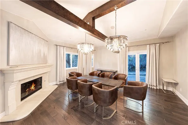 a large kitchen with stainless steel appliances granite countertop a stove and a sink