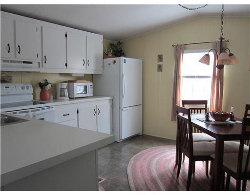 304 Fowler Road Woodland, ME 04736 - Photo 5 of 9 Kitchen. lots of natural light adds...