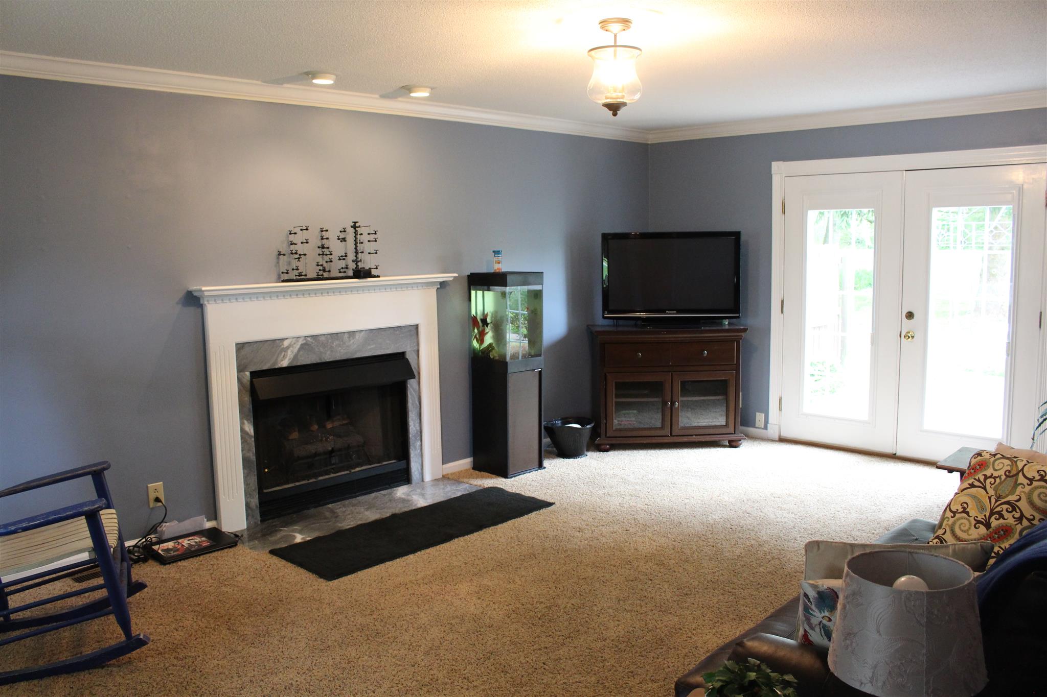 Great Room with gas fireplace, new carpet  