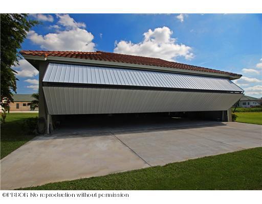 15920 Weatherly Road Wellington, FL 33414 - Photo 2 of 13 a view of a couches in the balcony