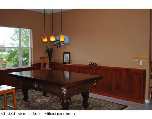 15920 Weatherly Road Wellington, FL 33414 - Photo 7 of 13 a view of a dining room with furniture and window