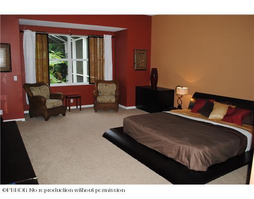 15920 Weatherly Road Wellington, FL 33414 - Photo 9 of 13 a living room with furniture and a window