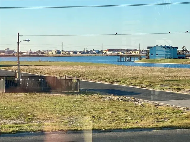 a view of a swimming pool and an ocean