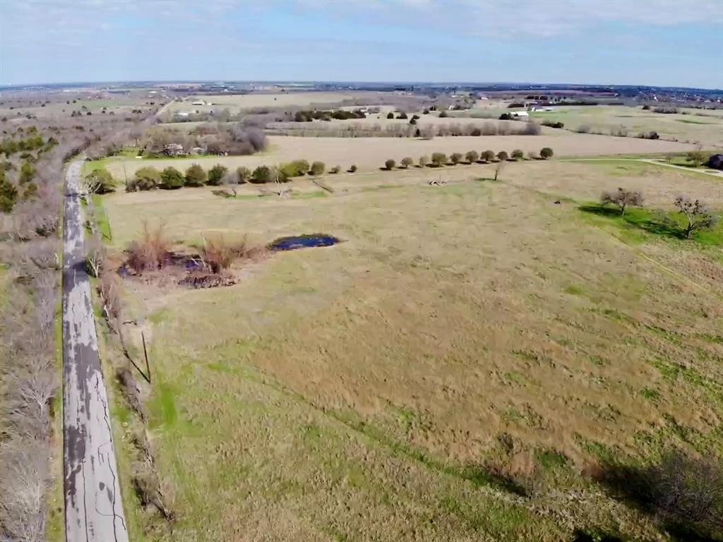 1900 Nesuda Road Ennis, TX 75119 - Photo 1 of 17 Aerial view over Northwest corner