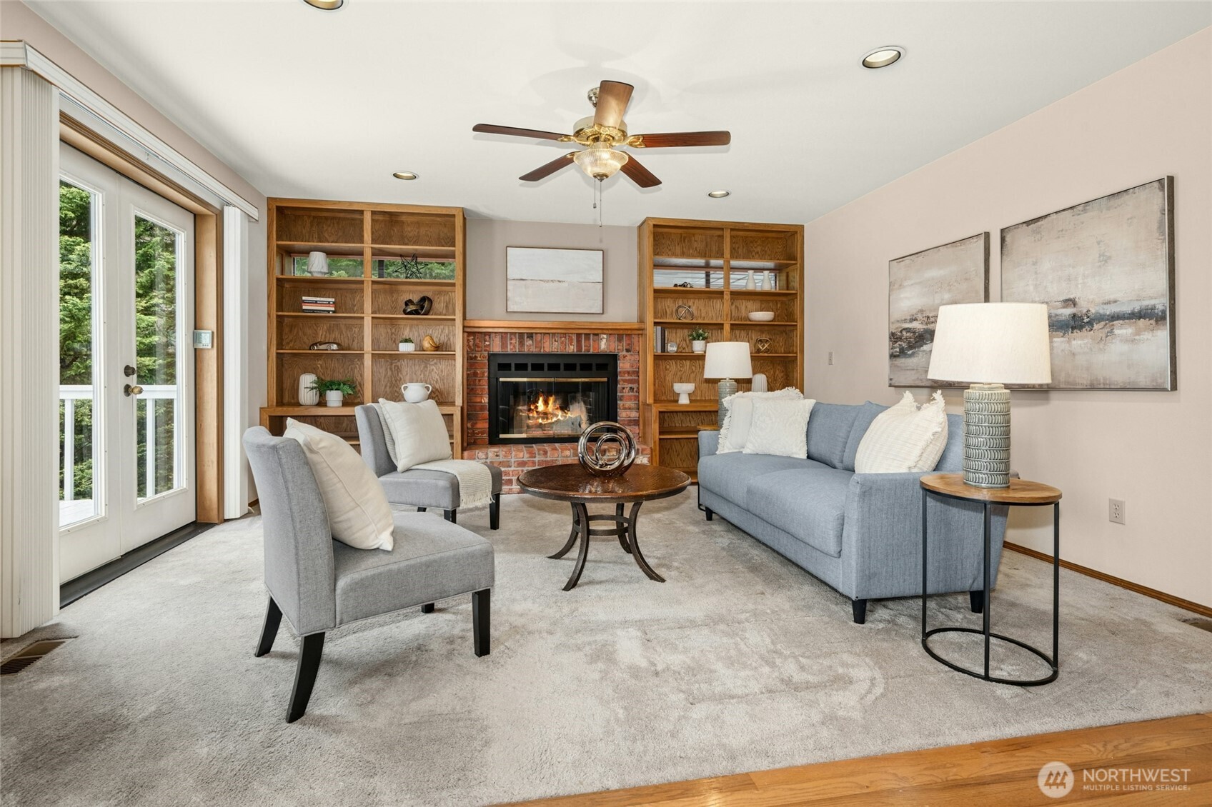 2420 Squak Mountain Loop Southwest Issaquah, WA 98027 - Photo 15 of 40 a living room with furniture and a fireplace