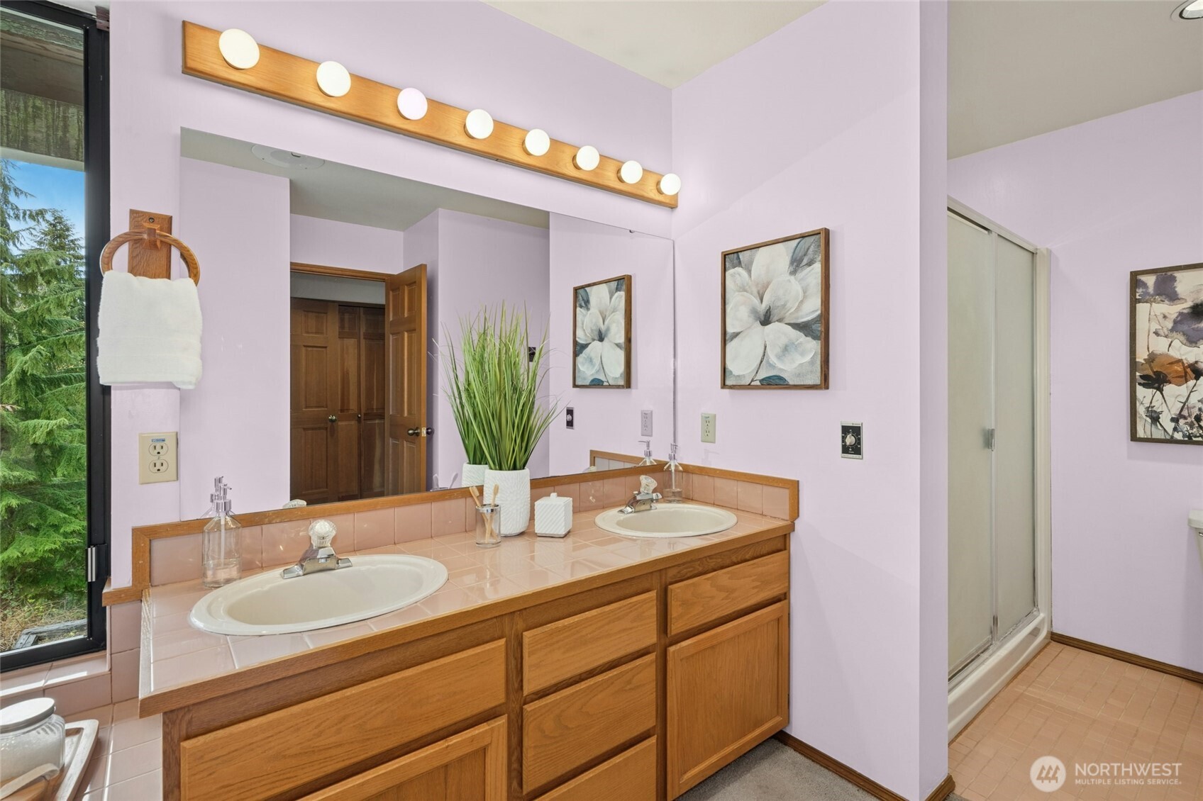 2420 Squak Mountain Loop Southwest Issaquah, WA 98027 - Photo 22 of 40 a bathroom with a granite countertop sink and a mirror