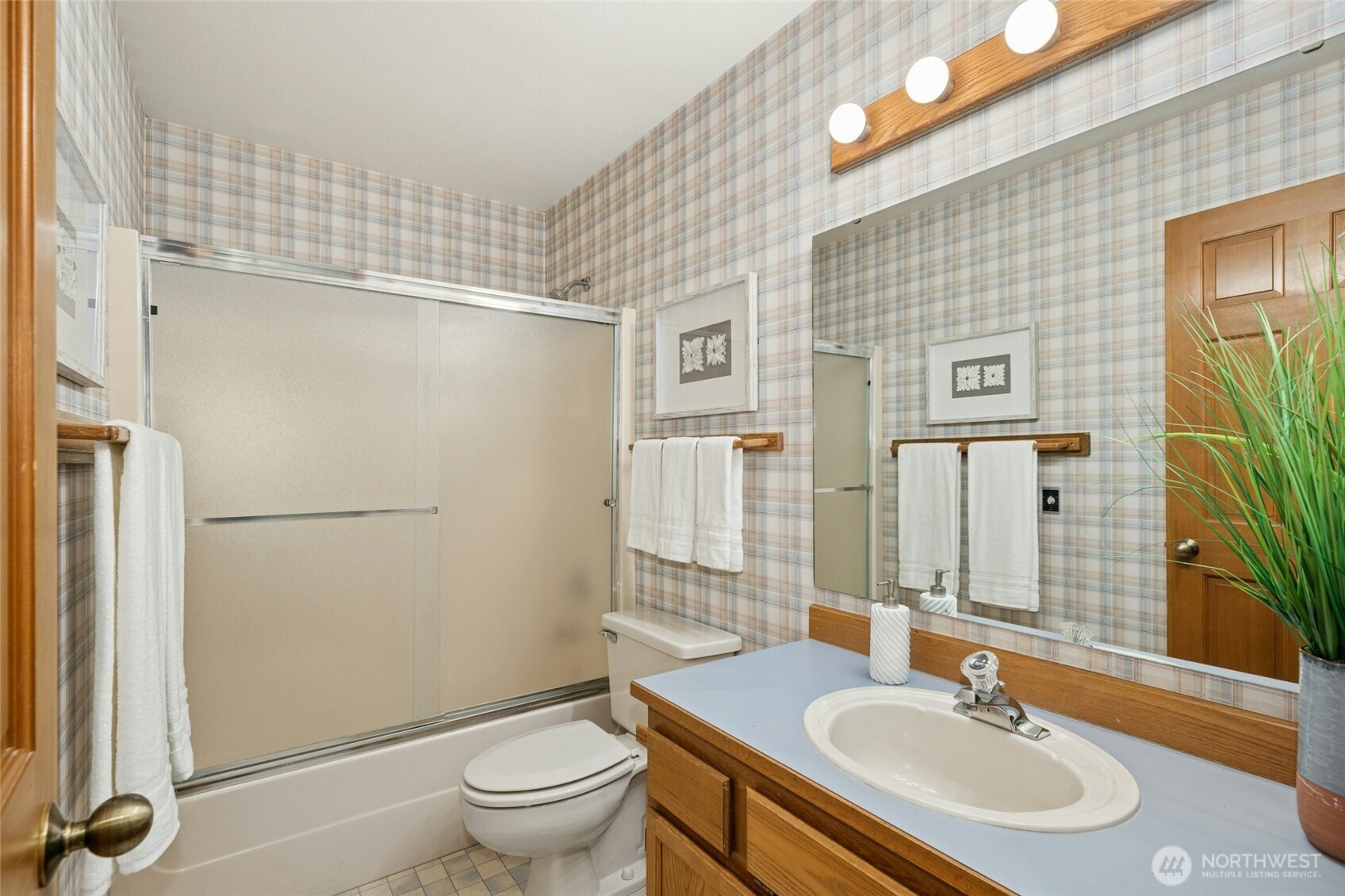 2420 Squak Mountain Loop Southwest Issaquah, WA 98027 - Photo 25 of 40 a bathroom with a sink toilet and shower