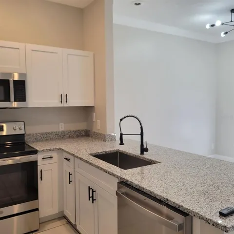 a view of front door with stairs