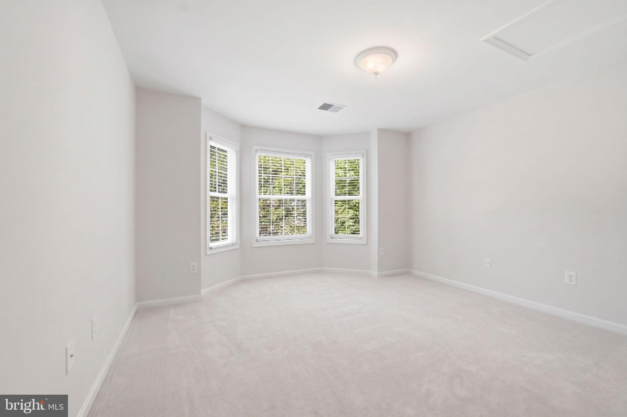 6075 Deer Ridge Trail Springfield, VA 22150 - Photo 45 of 61 an empty room with windows