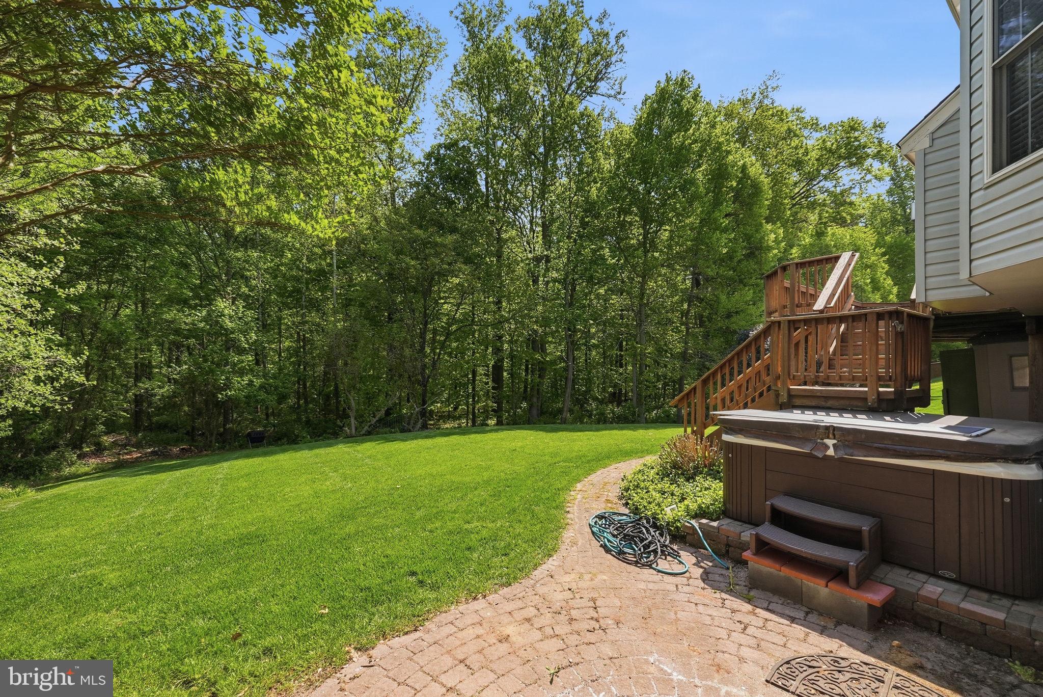 6075 Deer Ridge Trail Springfield, VA 22150 - Photo 59 of 61 a view of a backyard with sitting area