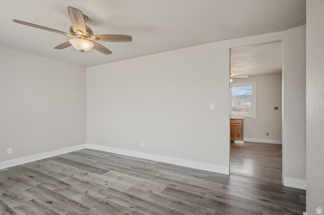 337 North Main Street Central Valley, UT 84754 - Photo 14 of 40 Spare room with a ceiling fan and light wood-type flooring