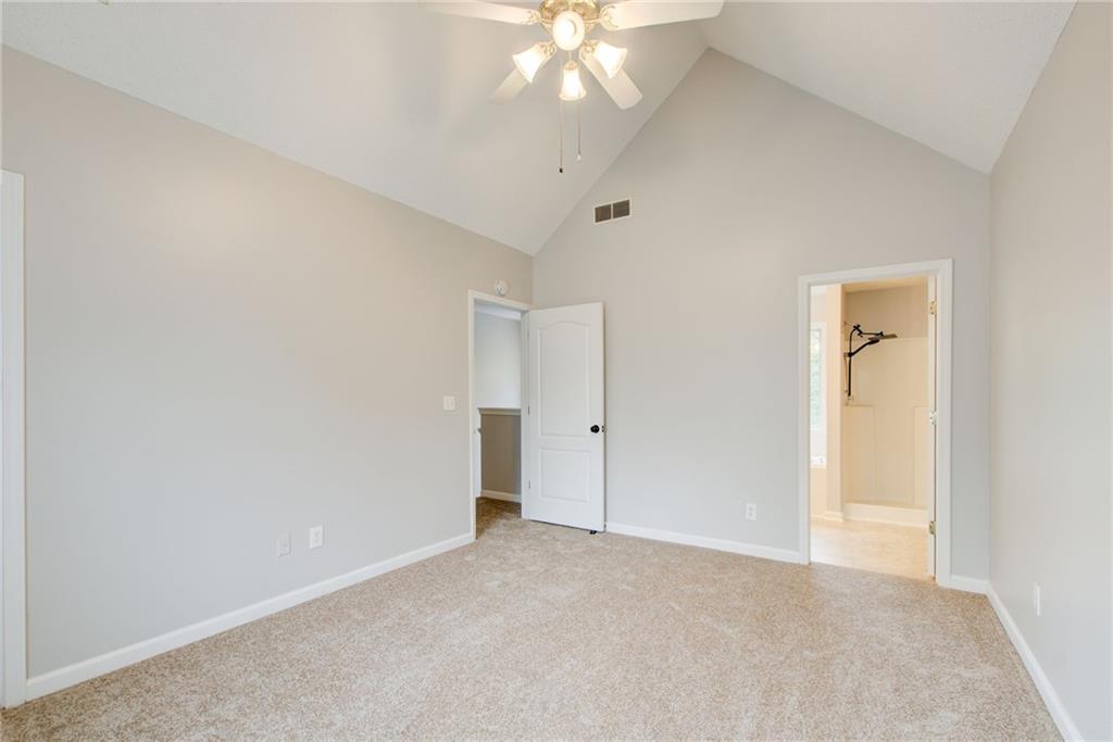 837 Ravins Way Stockbridge, GA 30281 - Photo 14 of 32 wooden floor in an empty room