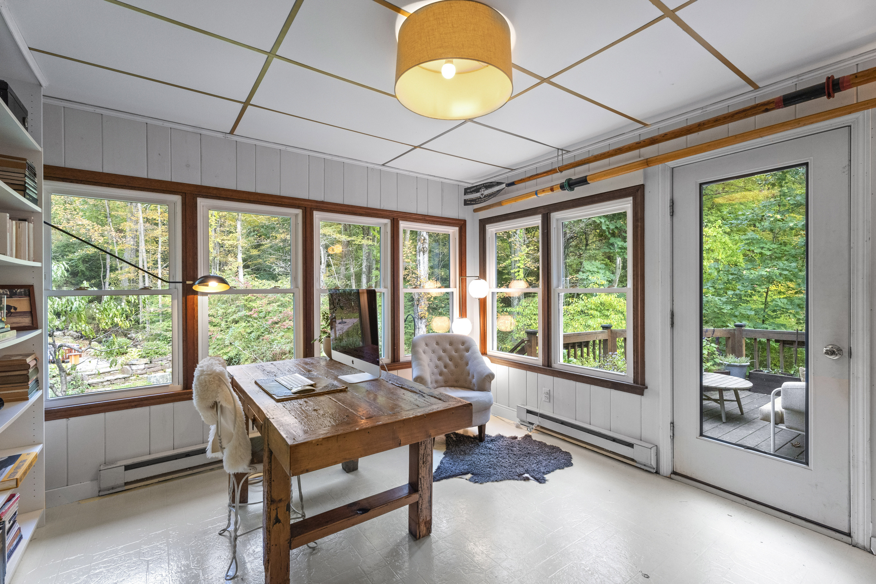 58 Middle Haddam Road East Hampton, CT 06456 - Photo 20 of 40 a living room with furniture and a floor to ceiling window