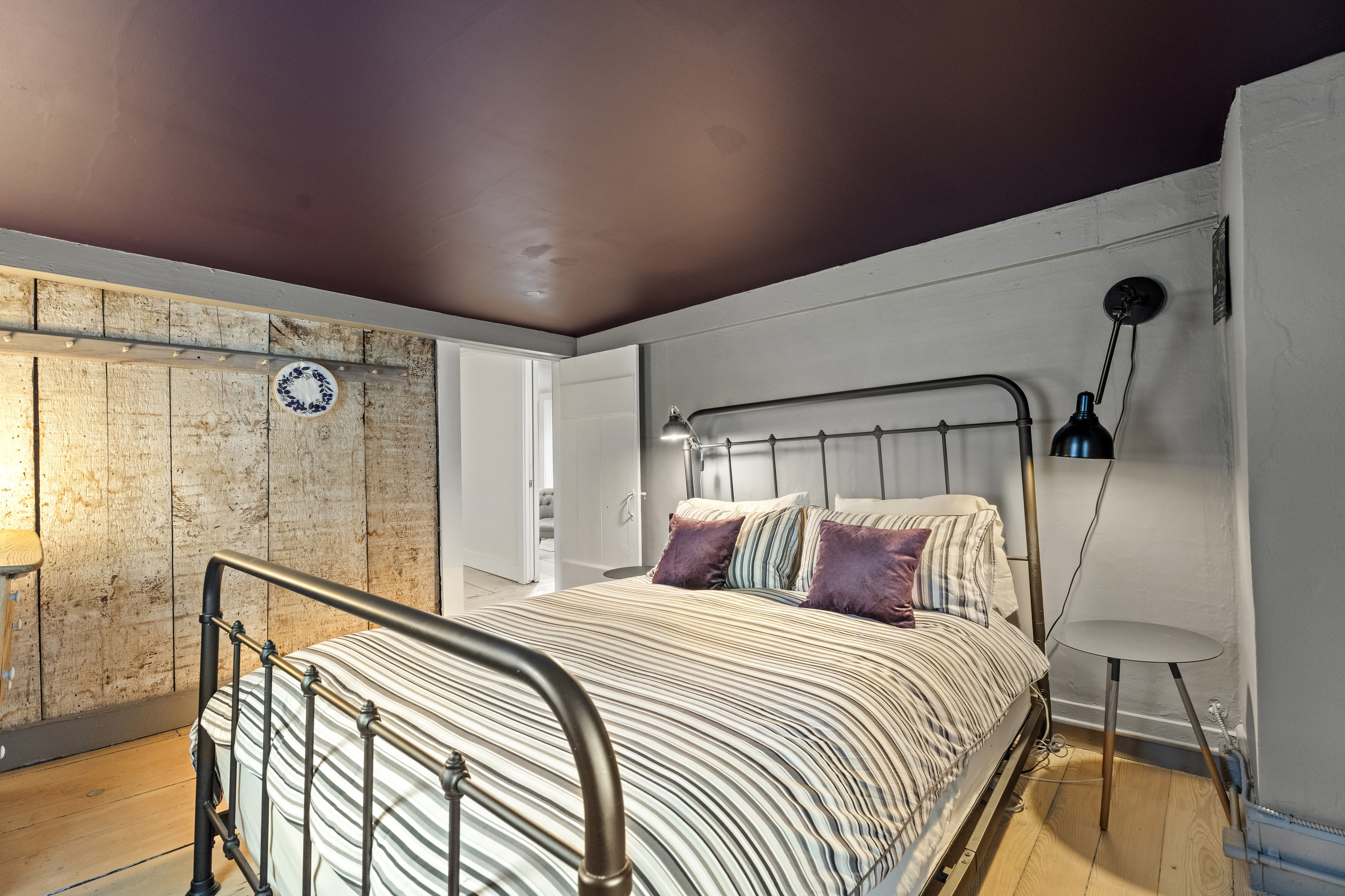 58 Middle Haddam Road East Hampton, CT 06456 - Photo 25 of 40 a bedroom with a bed and a large mirror next to a window