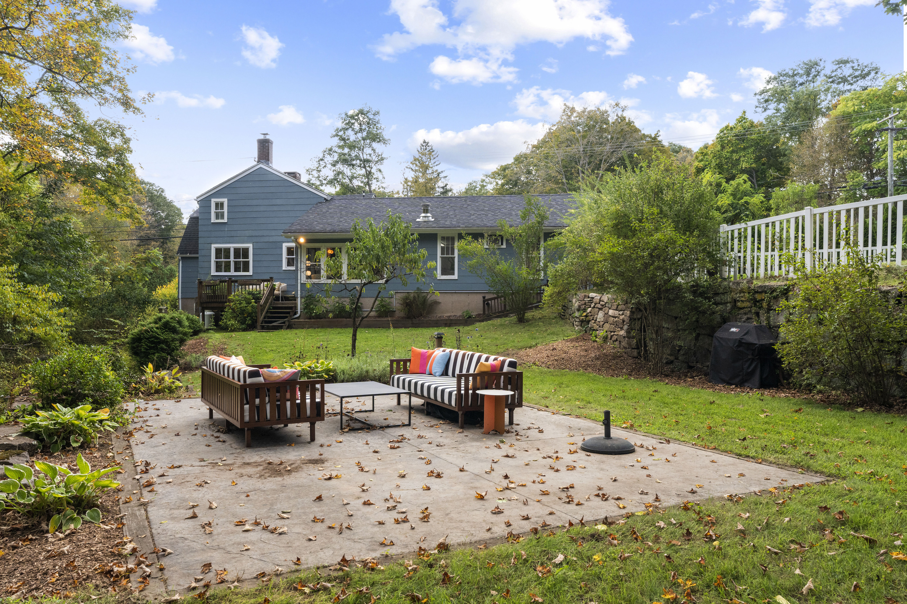58 Middle Haddam Road East Hampton, CT 06456 - Photo 35 of 40 a view of a house with backyard sitting area and garden