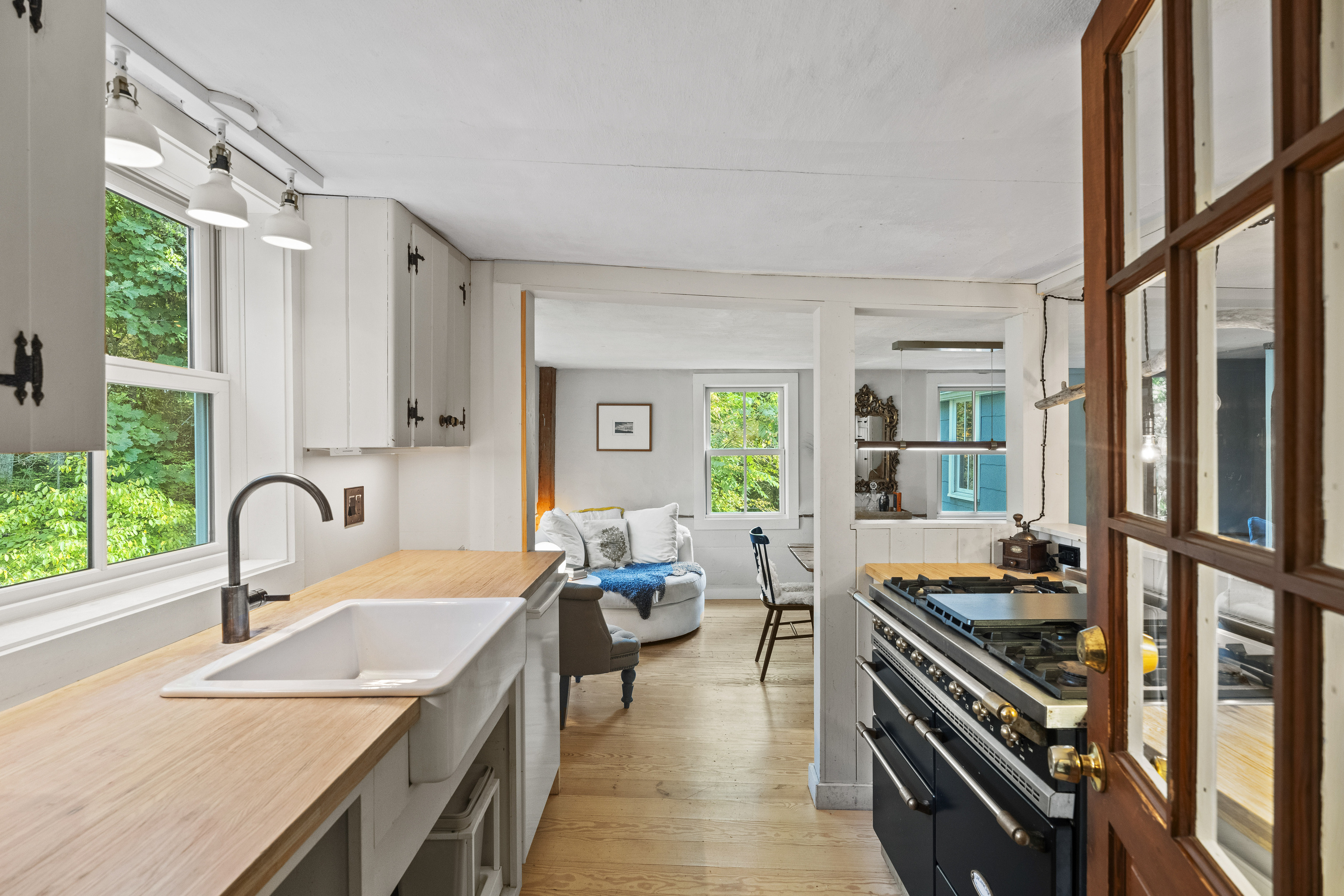 58 Middle Haddam Road East Hampton, CT 06456 - Photo 4 of 40 a kitchen with a large window appliances and cabinets