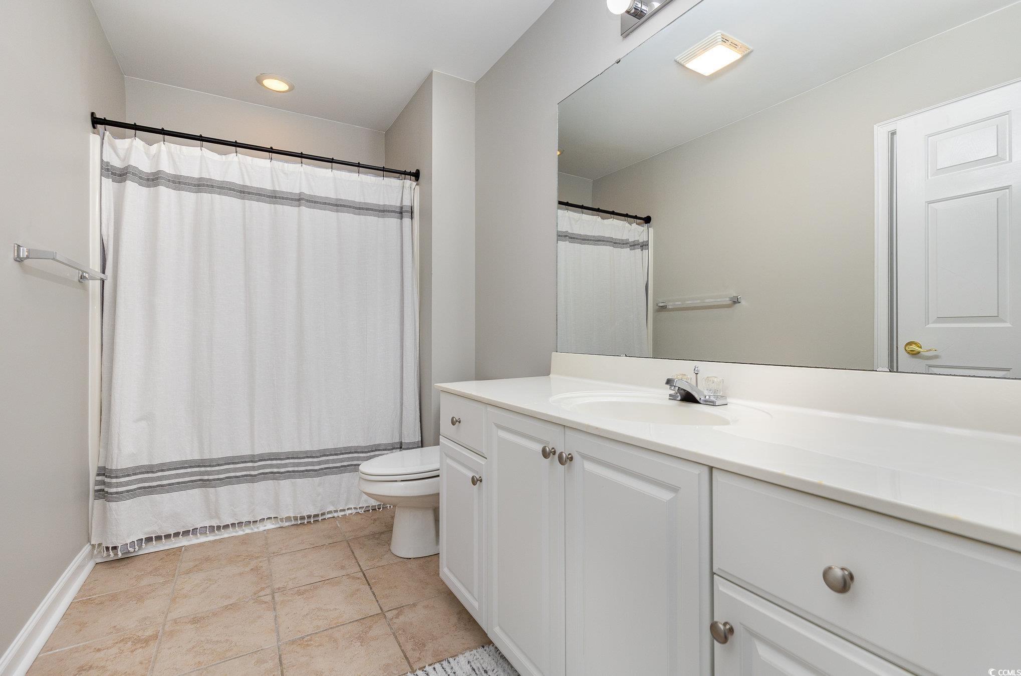 2740 Bayboro Street Loris, SC 29569 - Photo 33 of 40 Bathroom featuring tile patterned flooring, vanity