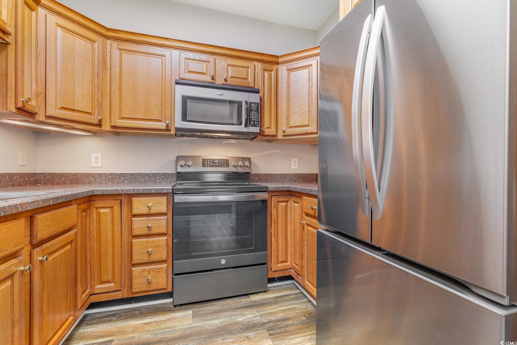 2740 Bayboro Street Loris, SC 29569 - Photo 6 of 40 Kitchen with light wood-type flooring and stainles