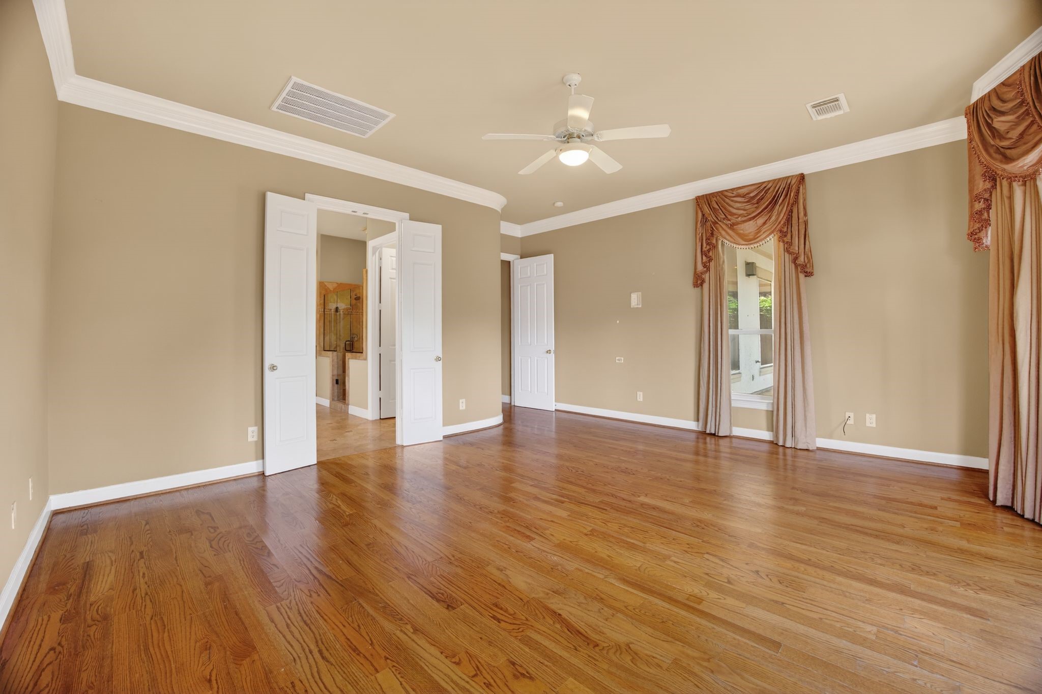 11511 Gallant Ridge Lane Houston, TX 77082 - Photo 24 of 49 a view of an empty room with wooden floor