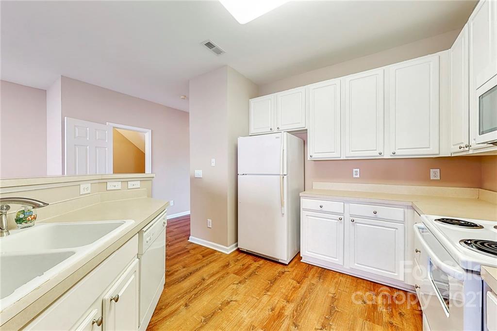 924 Azurine Circle Fort Mill, SC 29708 - Photo 17 of 41 a kitchen with a sink stove and refrigerator