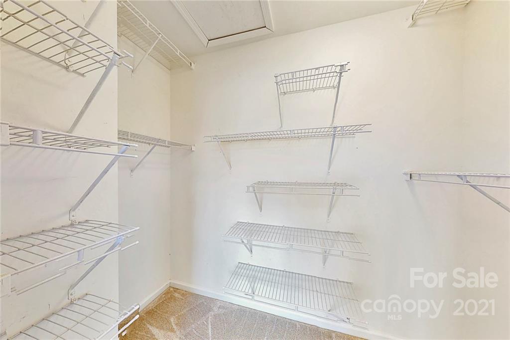 924 Azurine Circle Fort Mill, SC 29708 - Photo 20 of 41 a view of walk in closet with empty racks