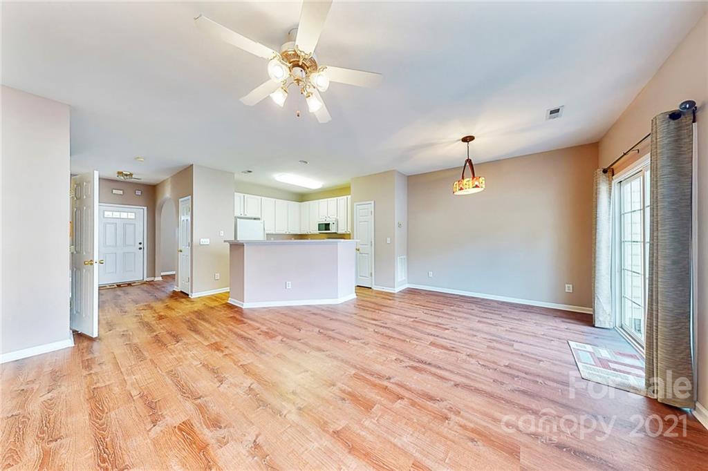924 Azurine Circle Fort Mill, SC 29708 - Photo 7 of 41 a view of a livingroom with a ceiling fan and window