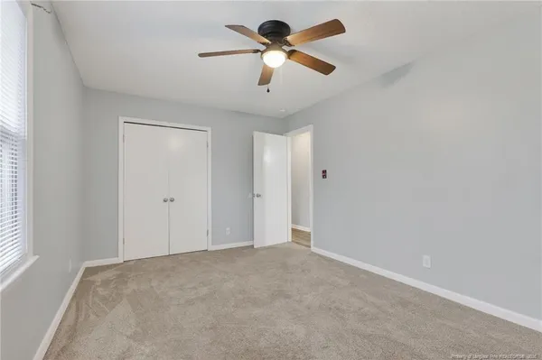 a view of room with hardwood floor