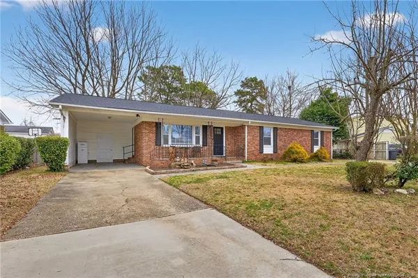 front view of a house with a patio