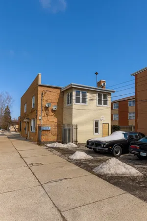 a car parked in front of a house