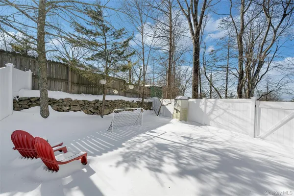 a view of a backyard of snow