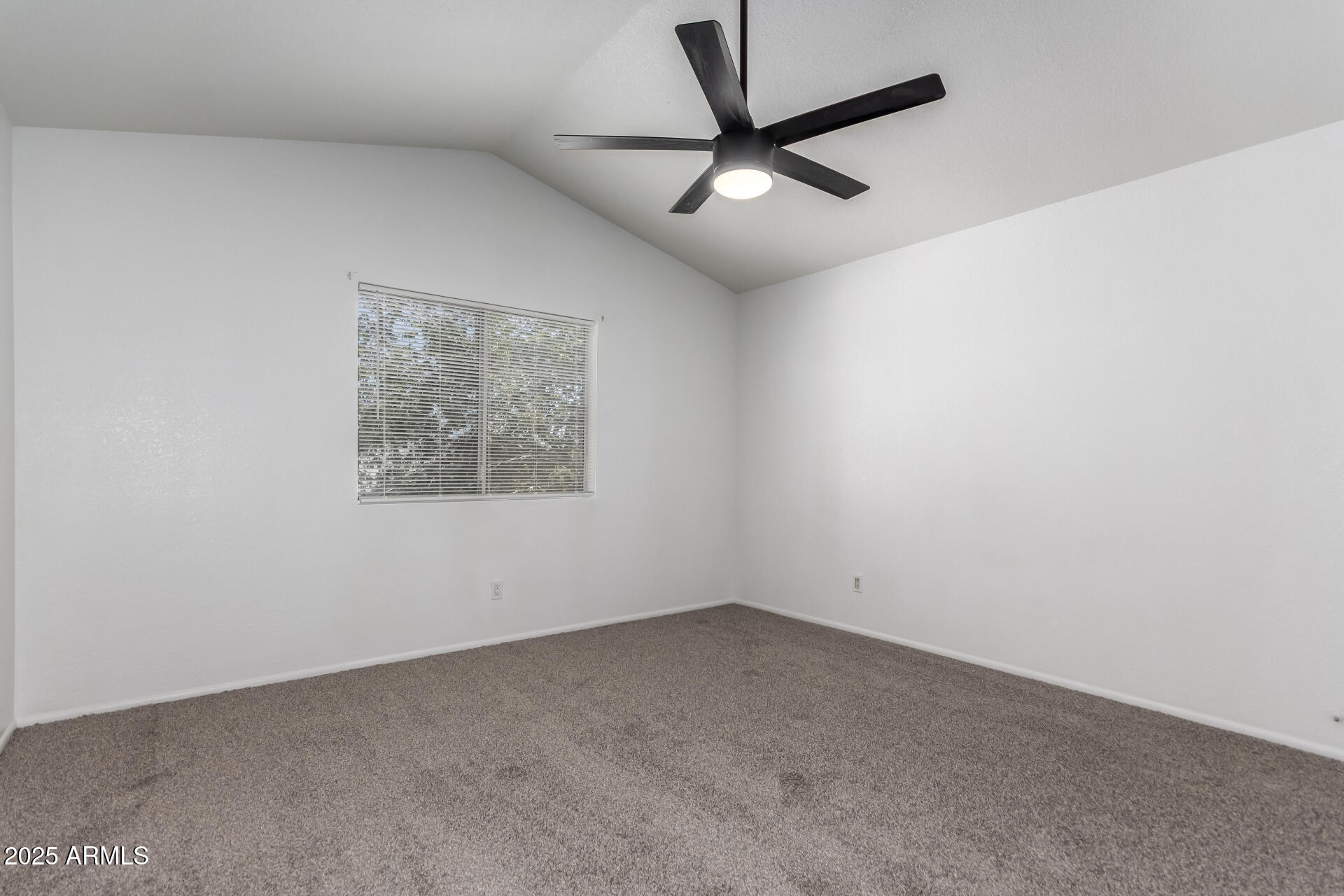 4162 East Wayland Road Phoenix, AZ 85040 - Photo 12 of 36 an empty room with a window