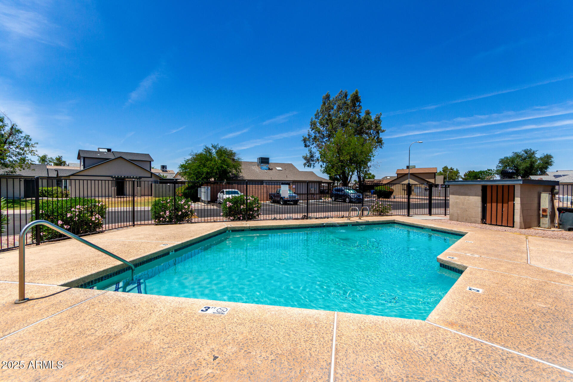 4162 East Wayland Road Phoenix, AZ 85040 - Photo 30 of 36 a view of a house with swimming pool