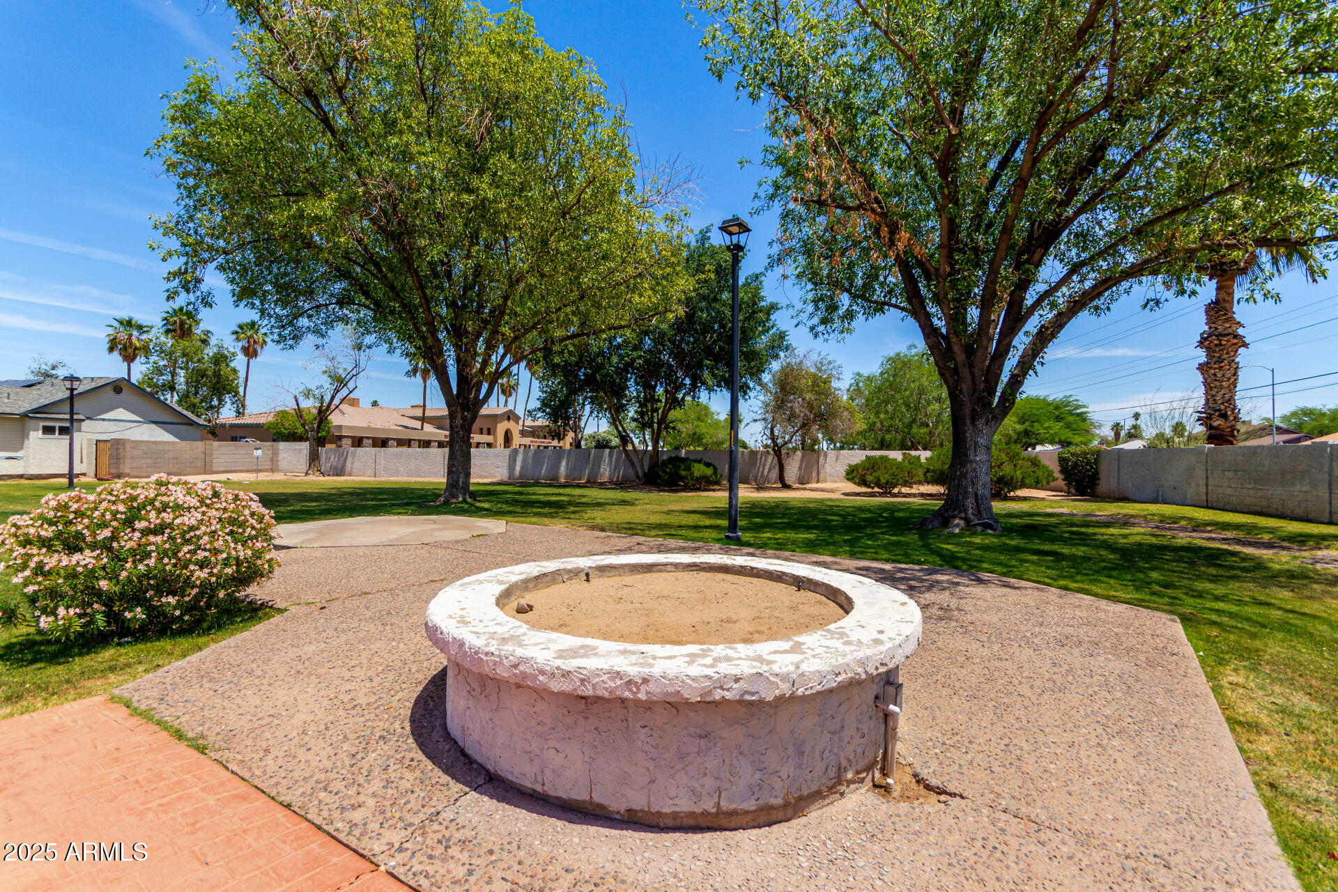 4162 East Wayland Road Phoenix, AZ 85040 - Photo 33 of 36 a view of a house with a swimming pool