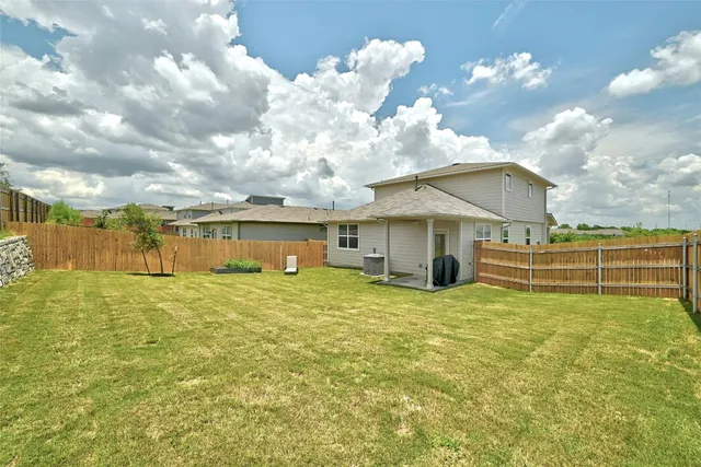 a house view with a garden space