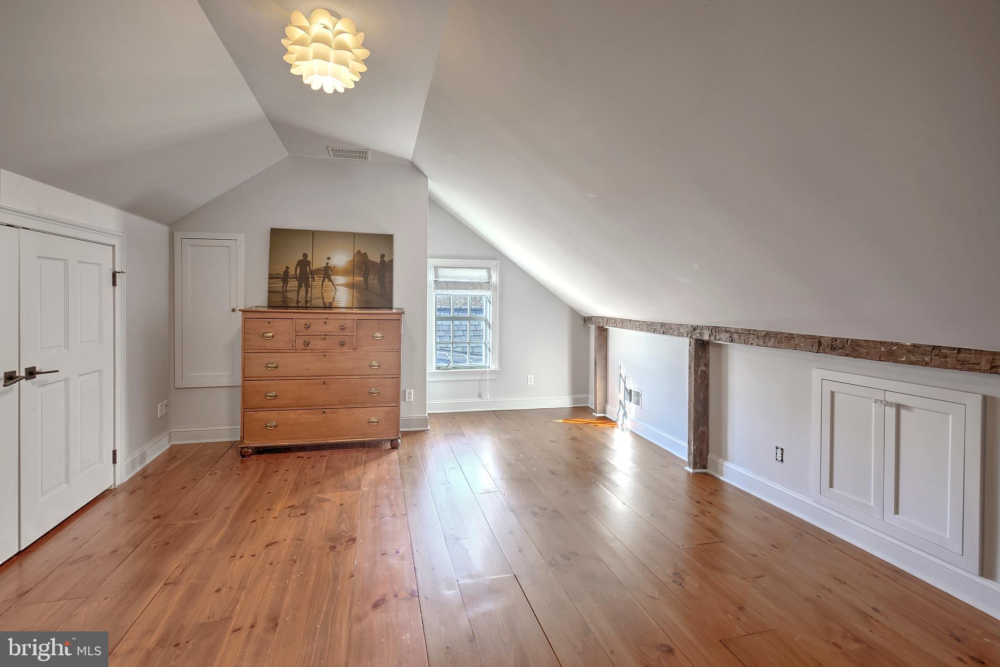 266 Province Line Road Skillman, NJ 08558 - Photo 57 of 71 wooden floor in an empty room with a window