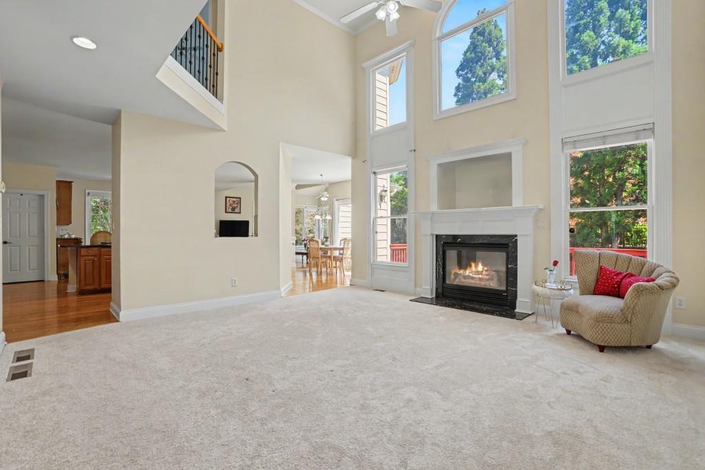 2123 Floral Ridge Drive Dacula, GA 30019 - Photo 15 of 56 a living room with furniture and a fireplace