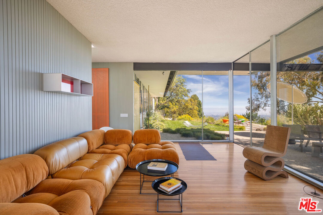 1531 North Tigertail Road Los Angeles, CA 90049 - Photo 4 of 24 a living room with furniture and a large window