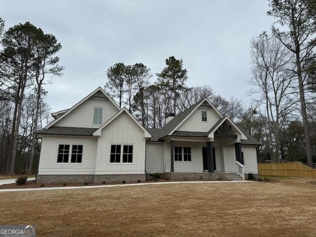 157 South Main Street Watkinsville, GA 30677 - Photo 1 of 1 a front view of a house with a yard