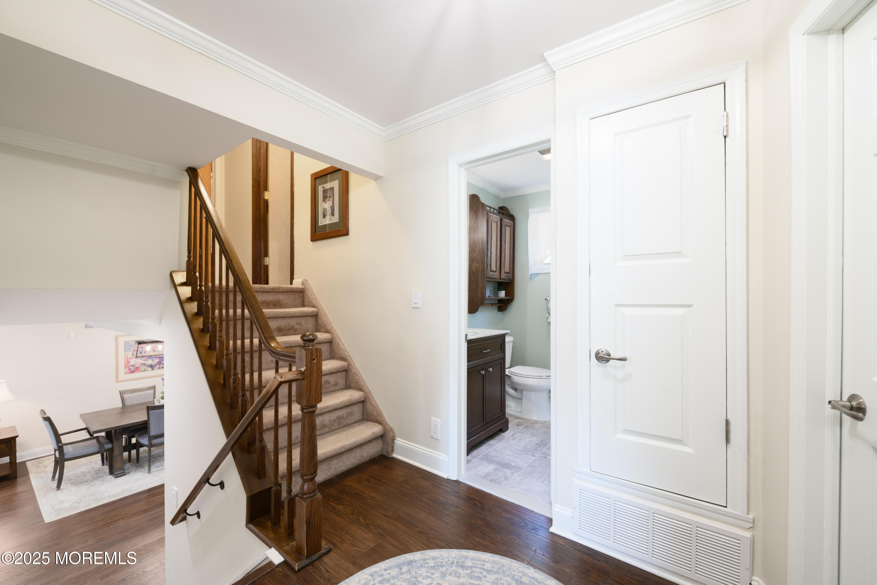 101 Millbrook Place Middletown, NJ 07748 - Photo 22 of 58 a view of entryway with wooden floor and stairs