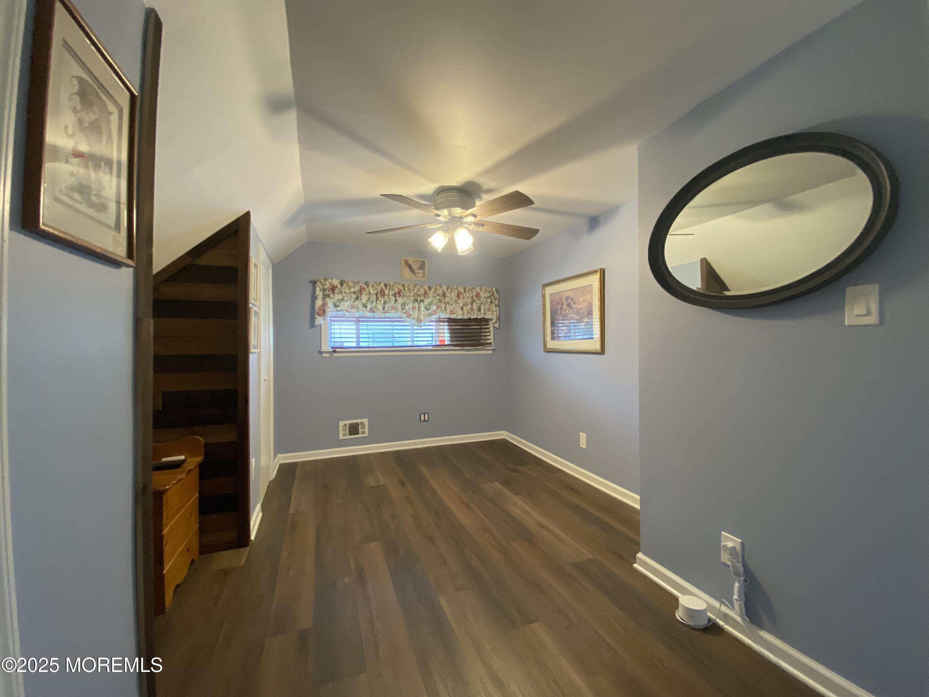 101 Millbrook Place Middletown, NJ 07748 - Photo 31 of 58 wooden floor and windows in a room